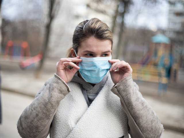 women wearing a mask